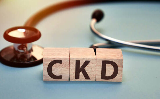 A patient discussing early-stage chronic kidney disease management with a doctor.